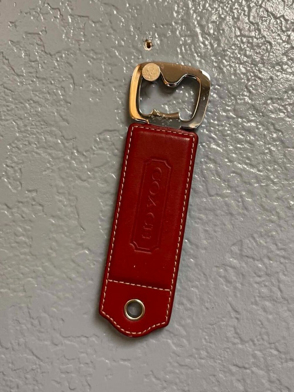 Coach bottle opener/keychain
